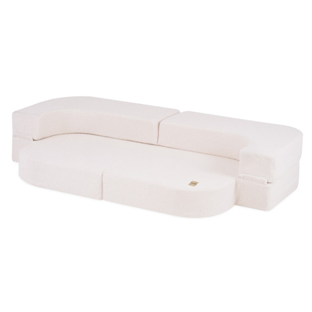 PLUSH NEST Schlafsofa Foldie, cremefarbenes Lammfell