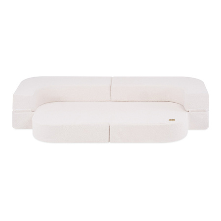 PLUSH NEST Schlafsofa Foldie, cremefarbenes Lammfell