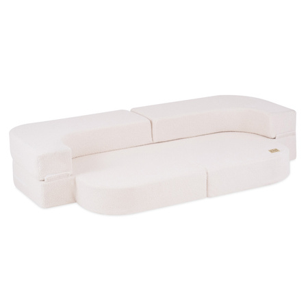 PLUSH NEST Schlafsofa Foldie, cremefarbenes Lammfell